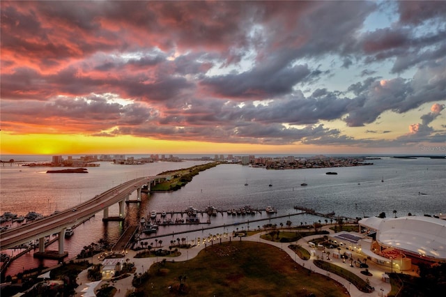 aerial view at dusk with a water view