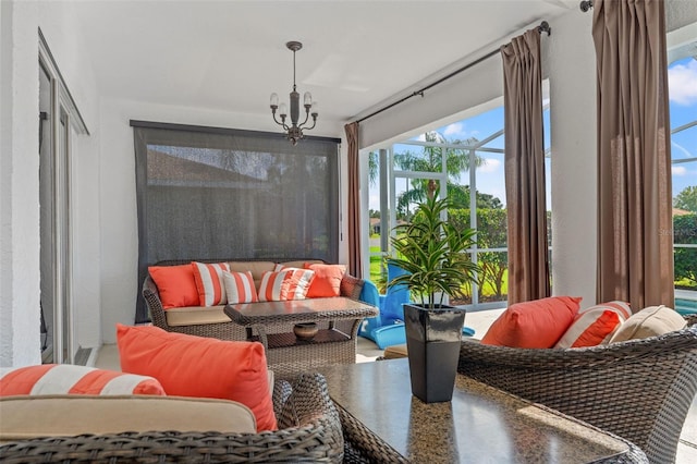 living room featuring a chandelier