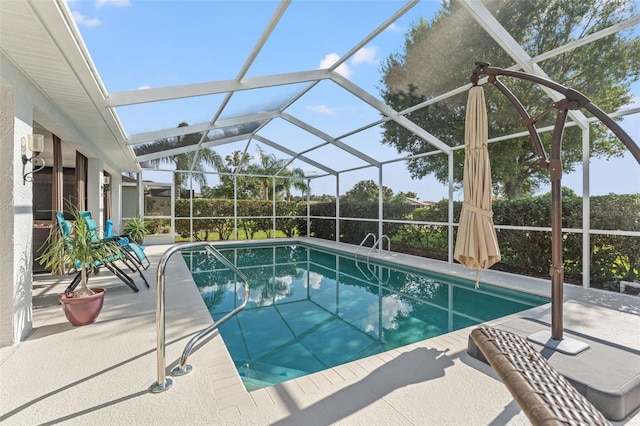 view of pool featuring a lanai and a patio area