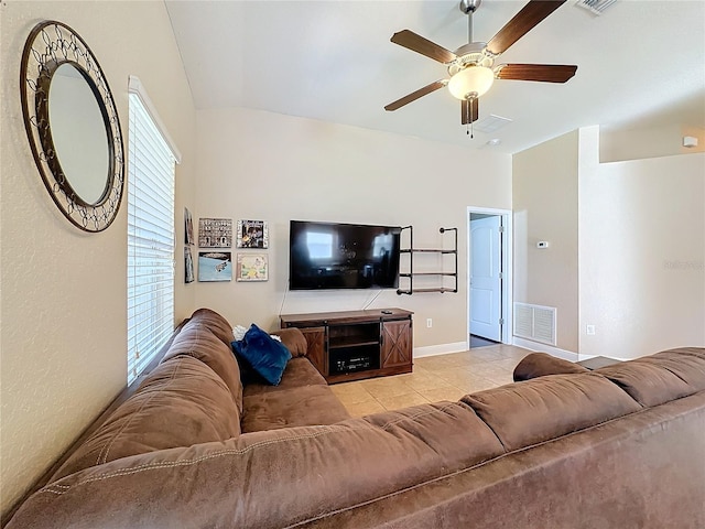 living room featuring ceiling fan and light tile patterned flooring