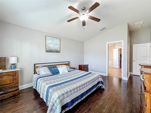 bedroom featuring ceiling fan, dark hardwood / wood-style floors, and lofted ceiling