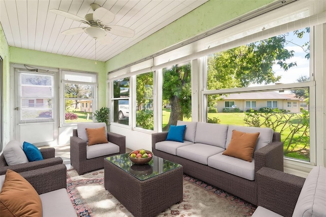 2222 Greenhaven Dr, Sun City Center, FL 33573 - sunroom / solarium featuring an outdoor hangout area and ceiling fan
