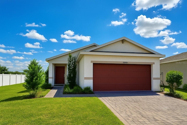 11883 Brighton Knoll Loop, Riverview, FL 33579 - single story home featuring stucco siding, decorative driveway, and an attached garage