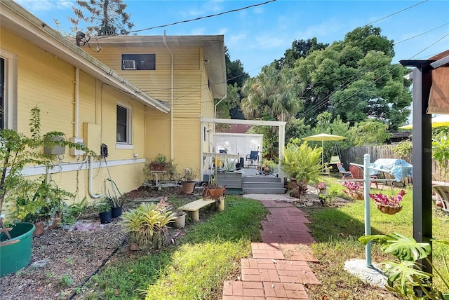 view of yard with a wooden deck