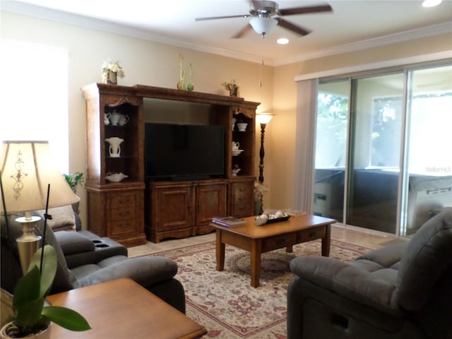 living room featuring ceiling fan and ornamental molding