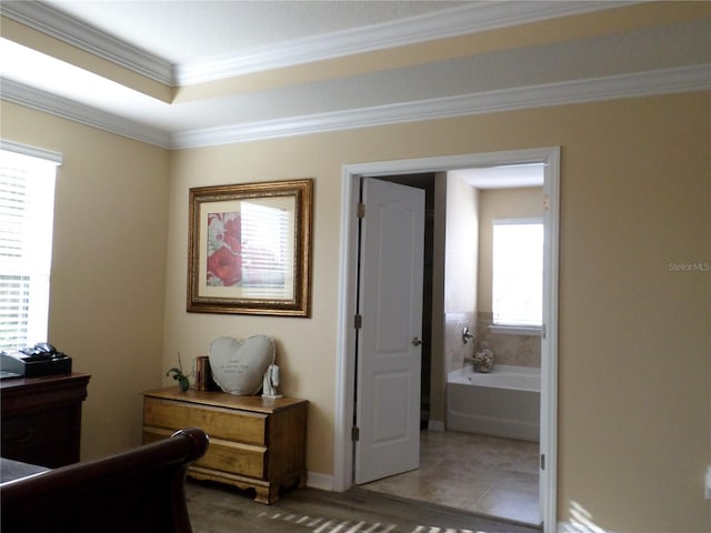 bedroom with multiple windows, crown molding, and light tile patterned floors