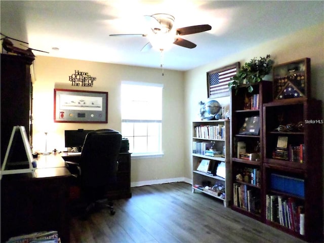 office with ceiling fan and dark hardwood / wood-style flooring