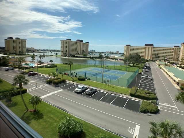 birds eye view of property with a water view