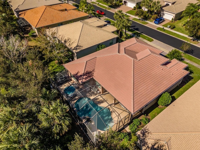 4977 Sapphire Sound Dr, Wimauma, FL 33598 - aerial perspective of suburban area featuring a pool area