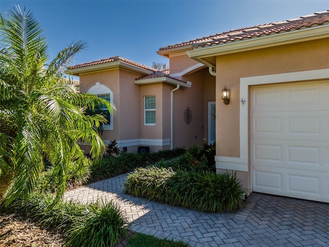 entrance to property with a garage