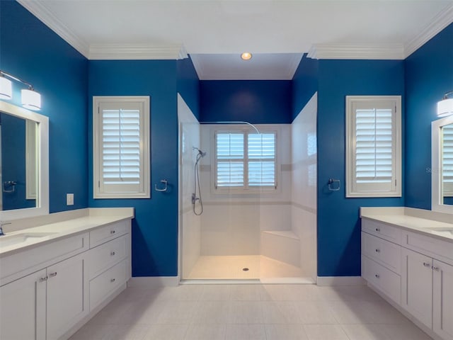 bathroom with vanity, ornamental molding, and walk in shower