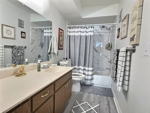 full bathroom with wood-type flooring, shower / bath combination with curtain, vanity, and toilet