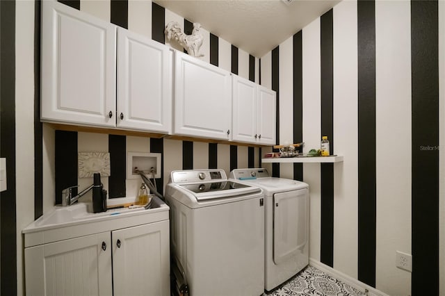 2539 Silverback Ct, Palm Harbor, FL 34684 - washroom with washer and clothes dryer, wallpapered walls, cabinet space, and baseboards