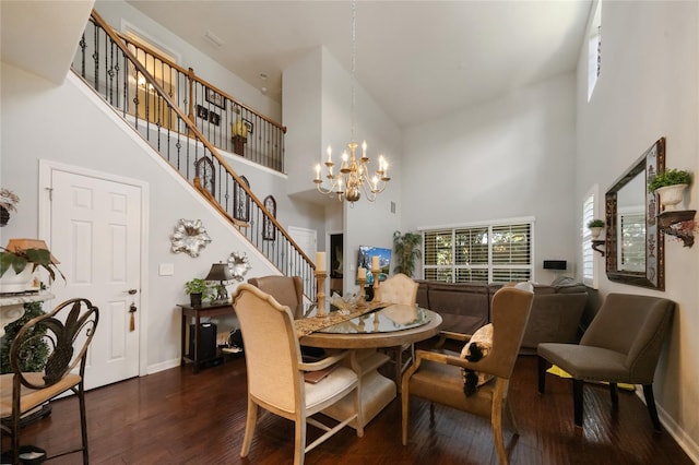 2539 Silverback Ct, Palm Harbor, FL 34684 - dining room with hardwood / wood-style flooring, stairway, a chandelier, and baseboards