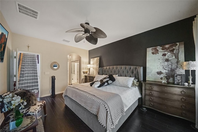 2539 Silverback Ct, Palm Harbor, FL 34684 - bedroom featuring a ceiling fan, wood finished floors, arched walkways, and visible vents