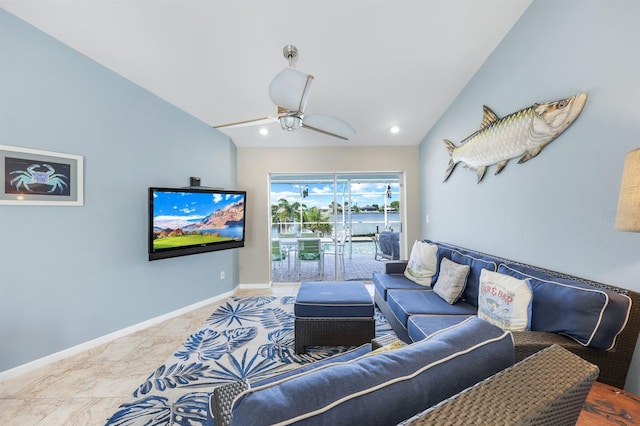 living room featuring vaulted ceiling and ceiling fan