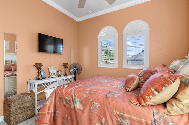 bedroom with ceiling fan and ornamental molding