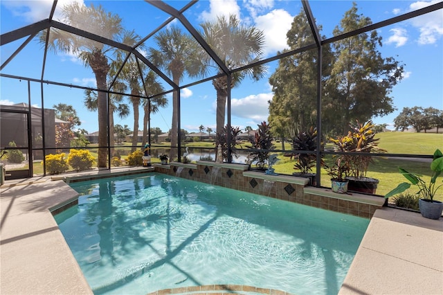 view of pool featuring pool water feature, a water view, a patio, and a lanai