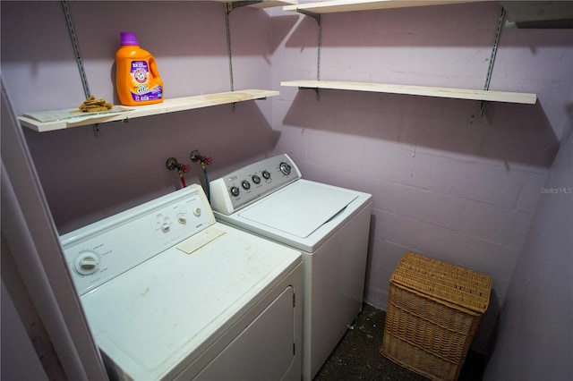 laundry area with washing machine and dryer