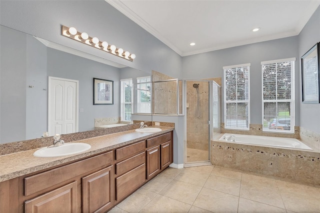 bathroom with independent shower and bath, vanity, ornamental molding, and tile patterned floors