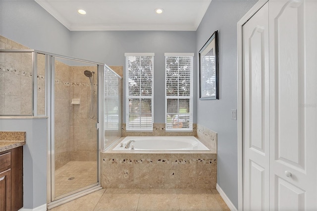 bathroom featuring ornamental molding, tile patterned flooring, vanity, and separate shower and tub