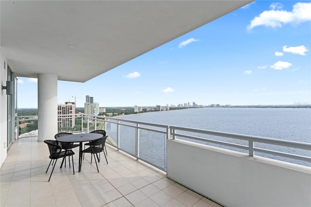 balcony featuring a water view