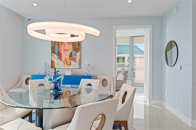 dining area with light tile patterned floors