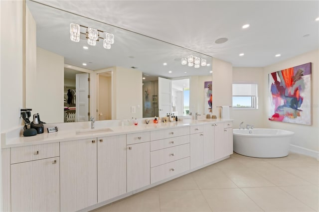 bathroom with independent shower and bath, vanity, and tile patterned floors