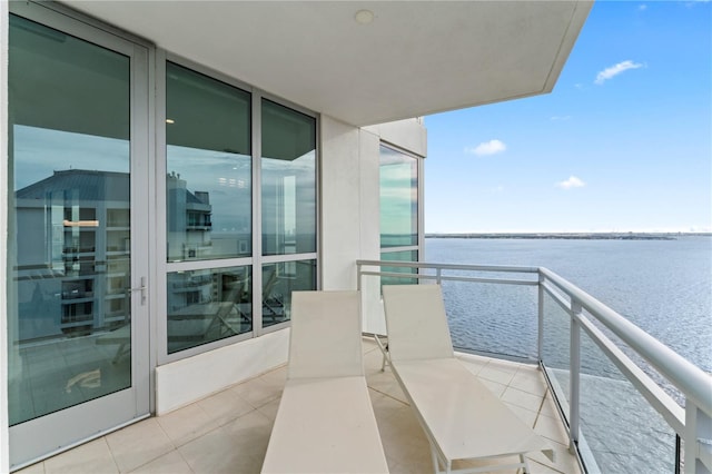 balcony featuring a water view