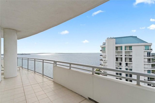 balcony featuring a water view