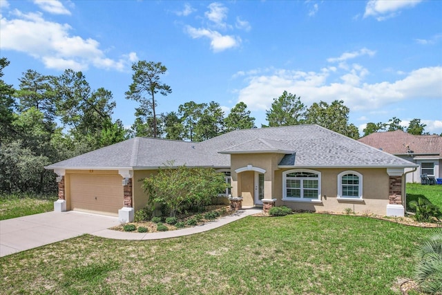 single story home with a garage and a front yard