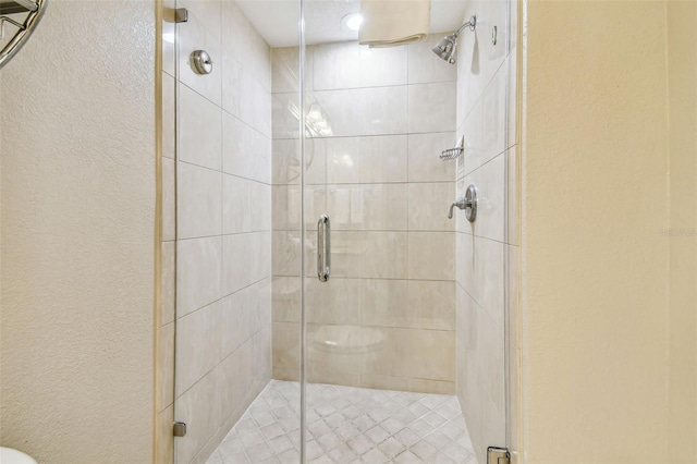 36750 US Highway 19 N Unit 04308, Palm Harbor, FL 34684 - full bath with a textured wall and a shower stall