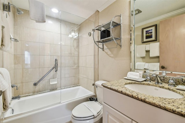 36750 US Highway 19 N Unit 04308, Palm Harbor, FL 34684 - full bathroom featuring toilet, crown molding, vanity, and combined bath / shower with glass door
