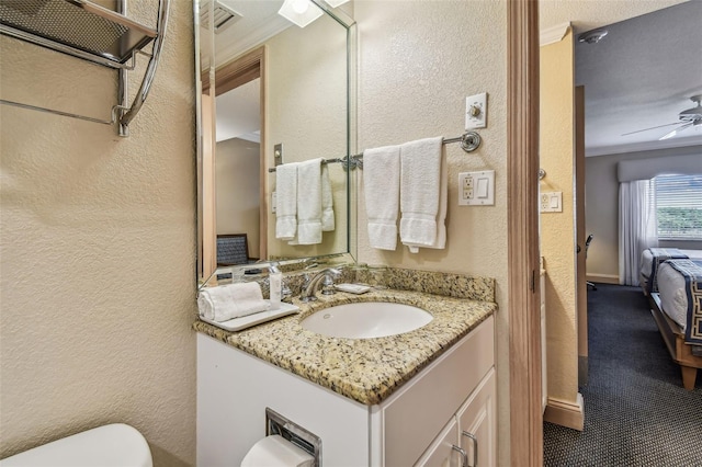 36750 US Highway 19 N Unit 04308, Palm Harbor, FL 34684 - half bath with toilet, ceiling fan, crown molding, a textured wall, and vanity
