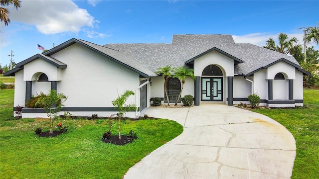 view of front of home with a front lawn