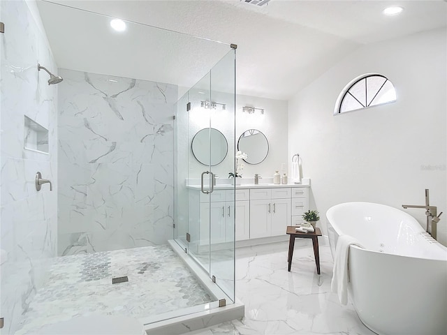 bathroom with vanity, lofted ceiling, and independent shower and bath