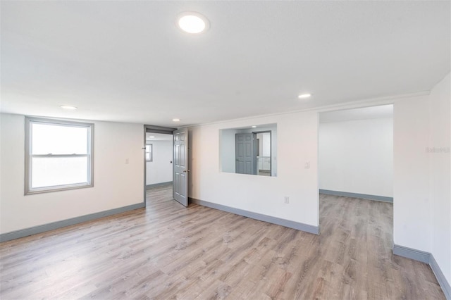 unfurnished room featuring light wood-type flooring