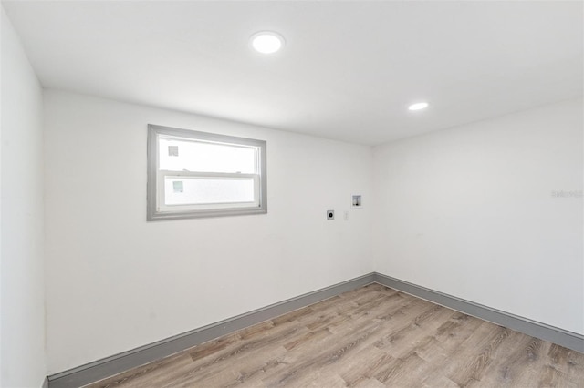 unfurnished room featuring light hardwood / wood-style flooring