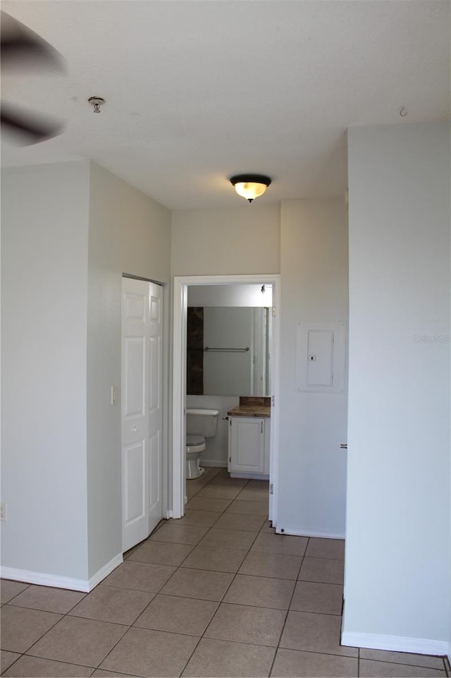 corridor featuring tile patterned floors