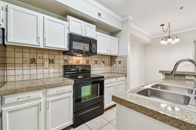 5608 Pinnacle Heights Cir Unit 305, Tampa, FL 33624 - kitchen with black appliances, a sink, crown molding, tile counters, and light tile patterned floors