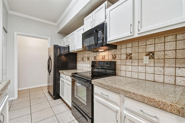 5608 Pinnacle Heights Cir Unit 305, Tampa, FL 33624 - kitchen featuring black appliances, ornamental molding, white cabinetry, backsplash, and light tile patterned flooring
