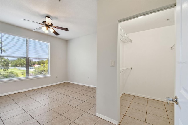 5608 Pinnacle Heights Cir Unit 305, Tampa, FL 33624 - interior space featuring light tile patterned floors and ceiling fan