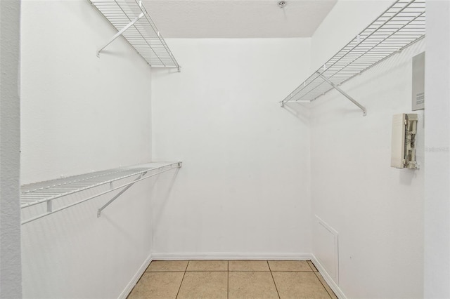 5608 Pinnacle Heights Cir Unit 305, Tampa, FL 33624 - spacious closet with light tile patterned floors