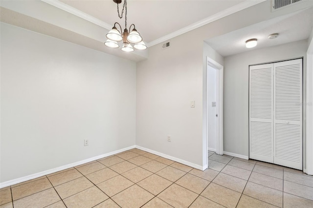 5608 Pinnacle Heights Cir Unit 305, Tampa, FL 33624 - unfurnished room with crown molding, a chandelier, baseboards, a smoke detector, and light tile patterned floors