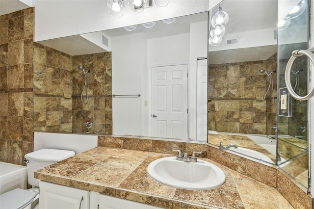5608 Pinnacle Heights Cir Unit 305, Tampa, FL 33624 - full bathroom with toilet, vanity, and tiled shower / bath