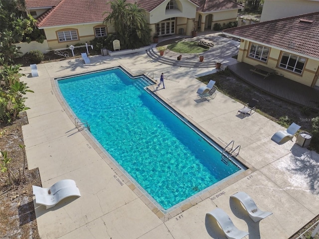 5608 Pinnacle Heights Cir Unit 305, Tampa, FL 33624 - community pool with a patio area