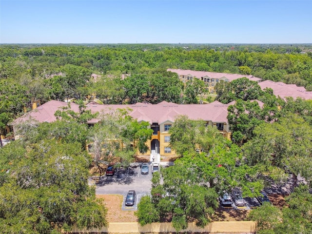 5608 Pinnacle Heights Cir Unit 305, Tampa, FL 33624 - drone / aerial view of a heavily wooded area
