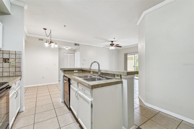 5608 Pinnacle Heights Cir Unit 305, Tampa, FL 33624 - kitchen featuring a sink, light tile patterned floors, ornamental molding, and white cabinetry