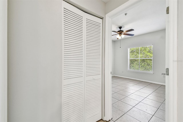 5608 Pinnacle Heights Cir Unit 305, Tampa, FL 33624 - detailed view of ceiling fan, baseboards, and a pendent fire sprinkler