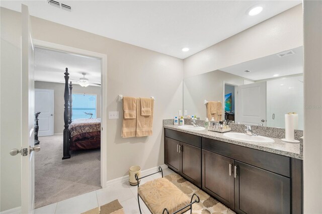 bathroom featuring tile patterned floors and vanity